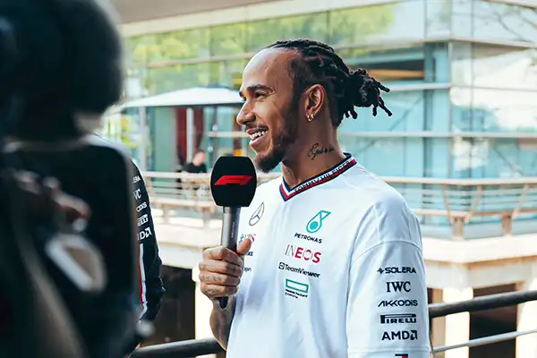 Hamilton Defends Move to Ferrari Slams Critics