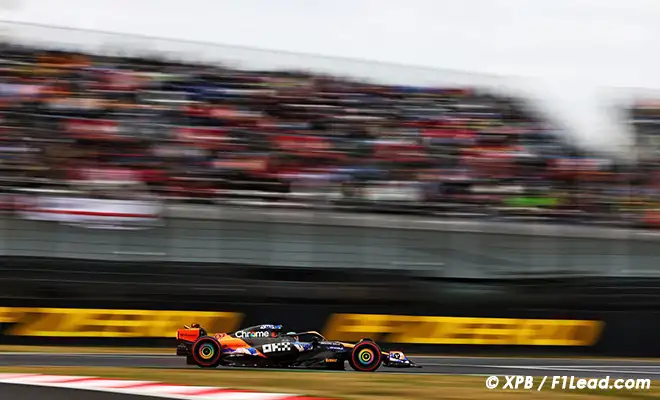 McLaren Close to Front Trails Behind Ferrari Red Bull
