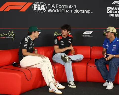 George Russell, Oliver Bearman and Pierre Gasly seated on a red sofa during the Thursday media session ahead of the 2026 Mexico City Formula 1 Grand Prix.
